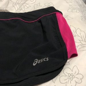 black ASICS shorts